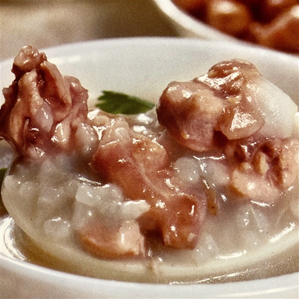 Chinese Duck Congee With Scallops And Mushrooms Served In Traditional Chinese Bowl 