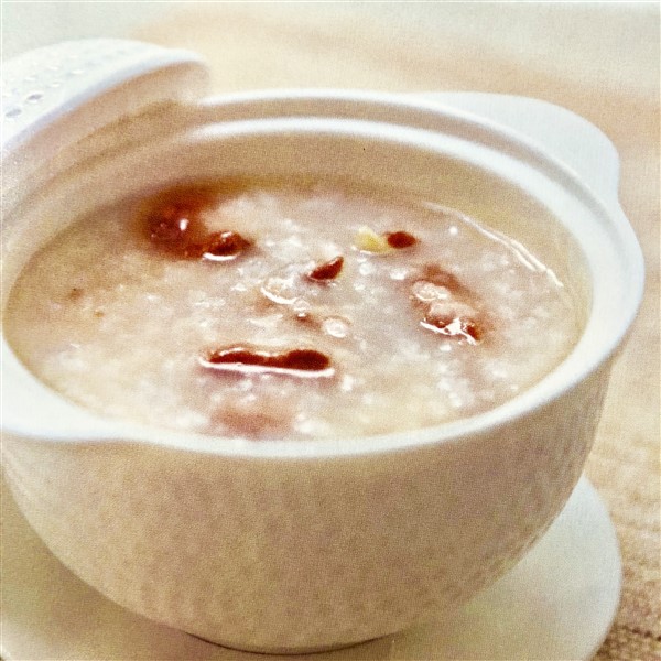 Chinese Traditional Beef Congee Served in Bowl For Dinner 