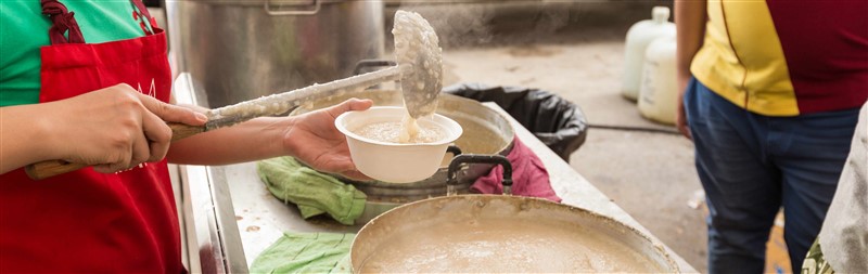 Beef Congee Being Served To Customer Out Of Street Vendor