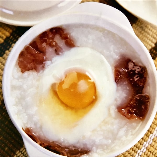 Chinese Beef Tenderloin Congee Served with Egg at Breakfast