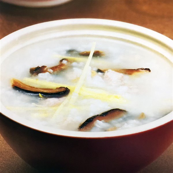 Chinese Chicken And Mushroom Congee In Bowl
