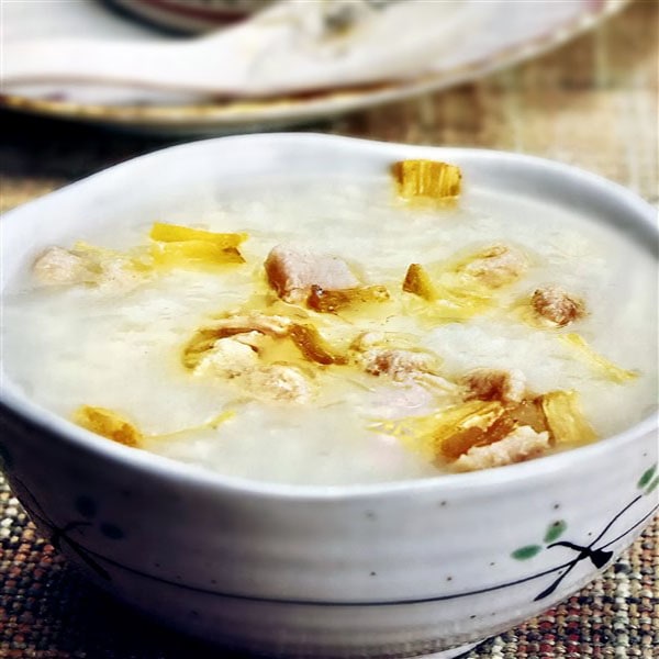 Amazing Chinese Chicken Congee with Dry Scallops at Breakfast 