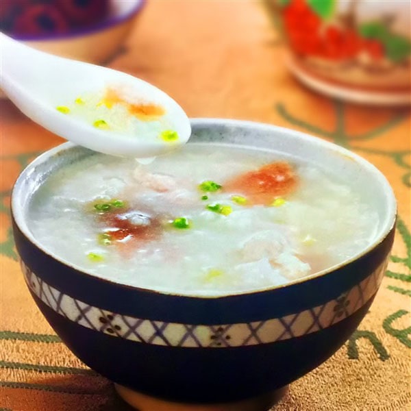 Nutritious Chinese Lean Pork and Liver Congee Served at Family Dinner