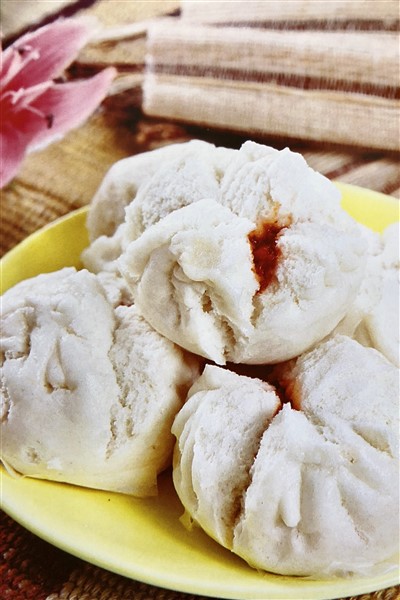 Delicious Char Siu Bao Being Served In Bamboo Steamer