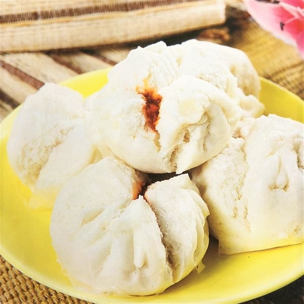 Delicious Char Siu Bao Being Served In Bamboo Steamer