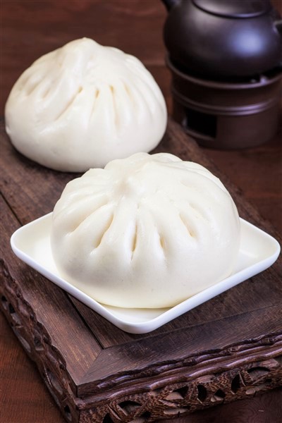 Chinese Pork And Mushroom Steamed Buns Served With Chinese Tea At Dim Sum 